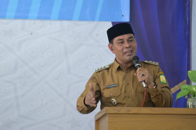 Bupati Aceh Besar, H. Muharram Idris membuka Rakor TPPS Kabupaten Aceh Besar Tahun 2025 di Aula UDKP Kantor Camat Darul Imarah, Aceh Besar, pada Selasa, (15/7/2025). FOTO/MC ACEH BESAR