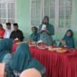 Ketua Staf Ahli  TP PKK Aceh, Mukaramah didampingi Bupati Aceh Tengah, Ketua TP PKK Aceh Tengah melakukan pembinaan  Gammawar didesa Blang Gele kec. Beneran Aceh tengah, 8/8/2025.(Foto:Dok.Biro Adpim Setda Aceh) 