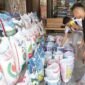 Pemilik Toko beras Boy Jaya di Pasar Induk Lambaro, Kecamatan Ingin Jaya, Aceh Besar, Senin (25/08/2025).FOTO/MC ACEH BESAR