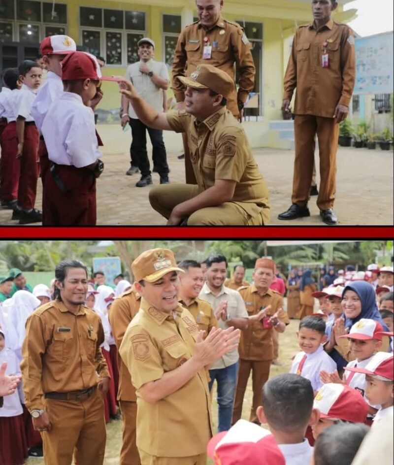 Wali Kota Lhokseumawe Dr. Sayuti Abubakar, S.H., M.H., menyerahkan secara simbolis bantuan seragam dan perlengkapan sekolah dari BNPB kepada siswa SD di Kecamatan Muara Dua dan Blang Mangat, Senin (19/1/2026).