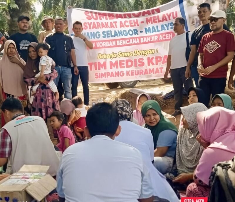 Masyarakat Aceh–Melayu Rawang, Selangor, Malaysia, bersama Tim Medis KPA Simpang Keuramat dan Laskar Pemuda Aceh menyalurkan bantuan sembako serta layanan kesehatan bagi penyintas banjir di sejumlah titik pengungsian Kecamatan Langkahan, Aceh Utara, Senin (19/1/2026).