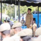 Bupati Aceh Besar H Muharram Idris jadi Pembina Apel Bersama di kompleks Kantor Satpol PP dan WH Kabupaten Aceh Besar, Selasa (10/2/2026).