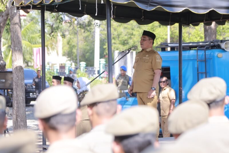 Bupati Aceh Besar H Muharram Idris jadi Pembina Apel Bersama di kompleks Kantor Satpol PP dan WH Kabupaten Aceh Besar, Selasa (10/2/2026).