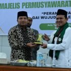 Staf Ahli Bupati Adi Darma SPd MPd, menghadiri Rakor MPU se-Aceh tahun 2026 di Aula Tgk H Abdullah Ujong Rimba, Komplek MPU Aceh, Kecamatan Darul Imarah, Kabupaten Aceh Besar, Selasa (14/4/2026). FOTO/ MC ACEH BESAR