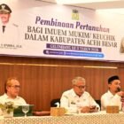 Asisten I Sekda Aceh Besar Farhan AP, membuka kegiatan Pembinaan Pertanahan bagi Imuem Mukim Gelombang II Tahun 2026 di Ilona Boutique Hotel, Rabu (6/5/2026). FOTO/MC ACEH BESAR