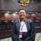 Penyidik Unit Cyber Polda Aceh menetapkan pria berinisial J sebagai tersangka kasus pencemaran nama baik terhadap Sekda Aceh, M. Nasir Syamaun, terkait unggahan hoaks dana bantuan bencana.