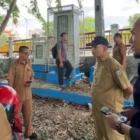 Kepala Diskominfotik Kota Banda Aceh, Muhammad Zubir, saat melakukan survei titik pemasangan CCTV di Underpass Beurawe, Senin (4/5/2026).