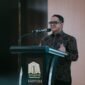 Plt Sekretaris Daerah Aceh, Taufik, membacakan sambutan Gubernur Aceh Muzakir Manaf dalam acara High Level Forum bertajuk “Membangun Ekosistem Ekonomi Umat Melalui Sinergi Zakat, Infak, Wakaf, Ekonomi Haji dan Umrah” di Aula Kantor Bappeda Aceh, Banda Aceh, Kamis (3/9/2026).