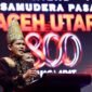 Wagub Aceh Fadhlullah menyerahkan bantuan buffer stock penanggulangan bencana senilai Rp6.787.464.091 kepada Pemkab Aceh Utara saat penutupan Milad 800 Samudera Pasai di Kantor Bupati, Minggu 13/9/2026.