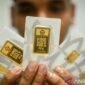 Antam naik jadi Rp 2.580.000/gram 5/10/2026 pukul 08.51 WIB dari Rp 2.574.000, buyback Rp 2.386.000; buyback >Rp 10 juta kena PPh 22 1,5% dan beli kena PPh 0,25%.
