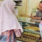 Pencairan bantuan jatah hidup (jadup) bagi penyintas banjir besar di Aceh Utara picu lonjakan beli emas di Toko Emas Murni II Keude Geudong Samudera lebih 50% dalam sepekan. 